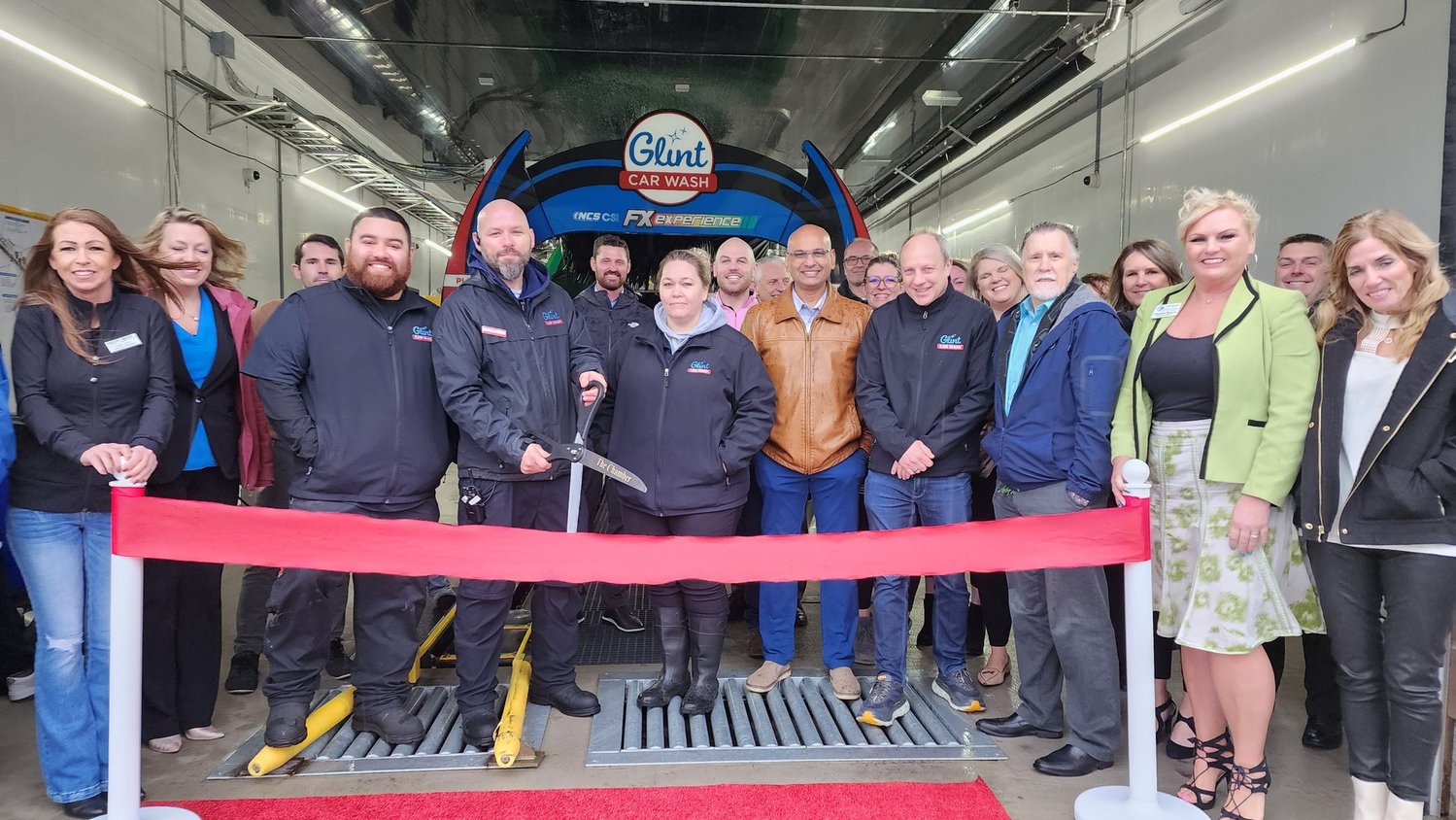Chamber of Commerce Cuts the Ribbon at Glint Car Wash in Chehalis The